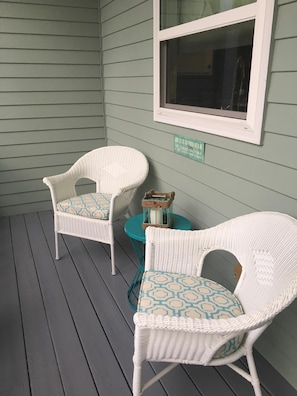 Front porch of Mermaid Cove is perfect for reading or enjoying morning coffee