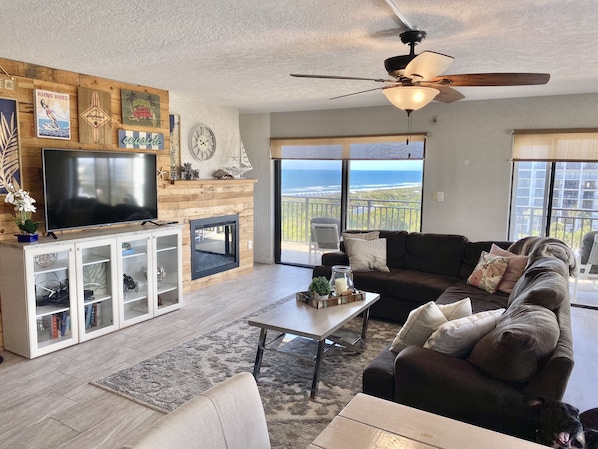 Great Room, 180 degrees of view from River to Ocean electric fireplace