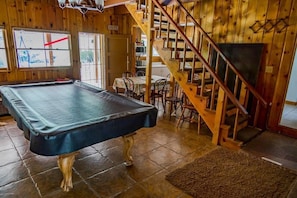 Entry with pool table and eating area