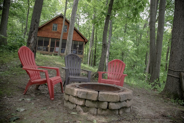 The best stories are told around the fire pit. Extra chairs stored in basement.