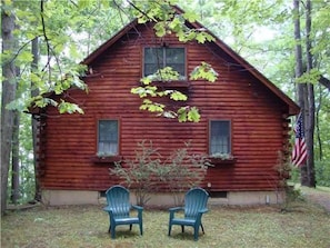 The west side of the cabin will greet you with ample parking and room for games.