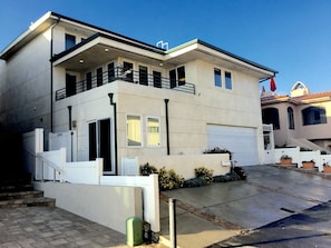 Home is one house from the beach. 25 tiny little steps to the beach.  