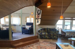 Great room has dining, TV, reading or foosball playing.