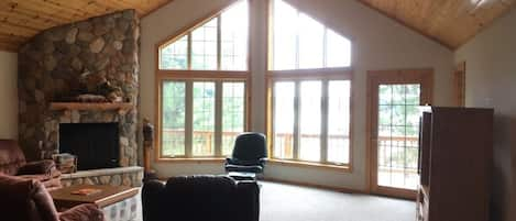 Front room with cathedral windows facing the lake