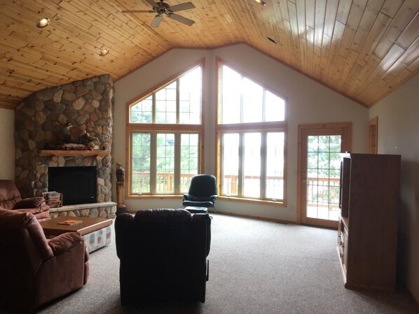 Front room with cathedral windows facing the lake