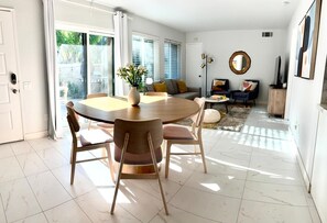 Dining area comfortably accommodates five to six guests.
