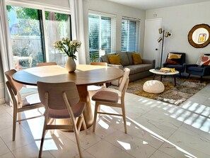 Dining area comfortably accommodates five to six guests.