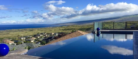 A beautiful Morning with the reflection of the clouds in the pool.