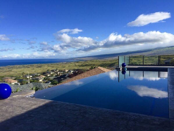 A beautiful Morning with the reflection of the clouds in the pool.