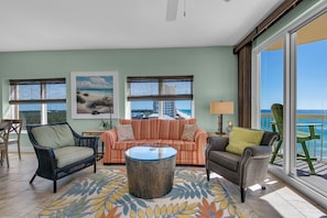 Living room with adjacent dining area.