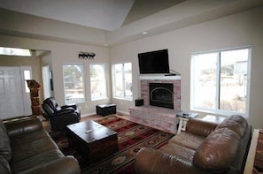 Family Room with great mountain & golf course views.   50' LED hi def TV w/DVD