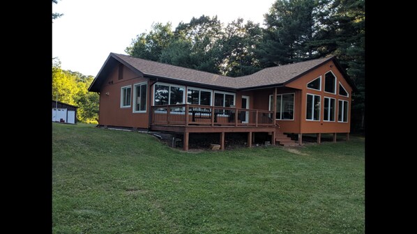 Deck on lakeside of house