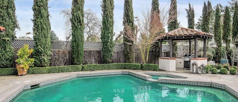 pool and hot tub with gazebo