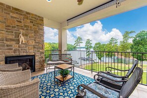 Spacious balcony also features an outdoor gas fireplace.