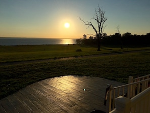 Front porch view of morning sunrise. No better place for a hot cup of coffee!