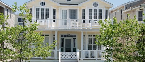 Front of house with a big sunny front porch