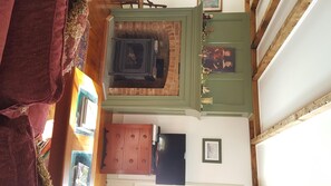 Living room with gas stove.