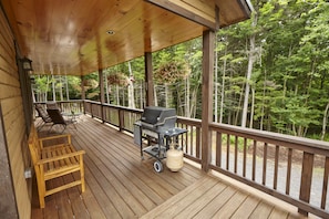 Covered Porch - perfect to enjoy the wooded view!