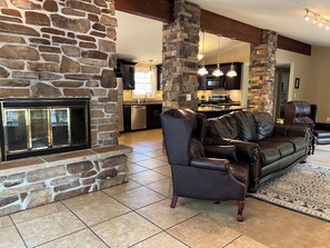 Great inviting area, lots of ceiling-floor windows 
2 way fireplace,deck access