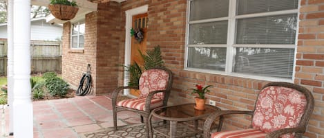 Welcome to Cocoa's Cottage! Spacious front porch...