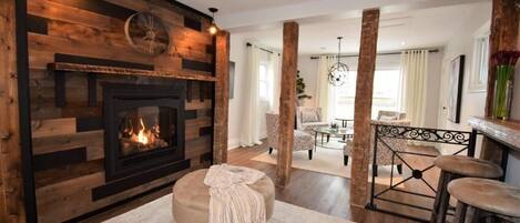 Welcome to The Clement House! The fireplace is new but the beams are from 1786.