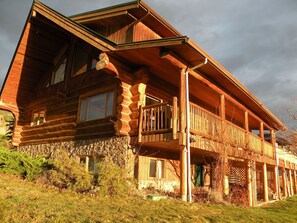 Upper 2 stories of this log home -nearly 5000sqft of decks & indoor living space