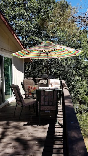 BBQ and outdoor seating just off the kitchen and family room