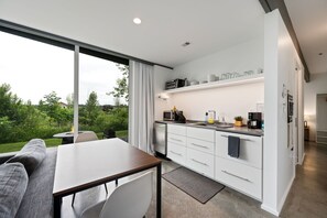 Fully stocked and smartly laid out. The efficient kitchenette includes everything you need for easy meals and late-night snacks.