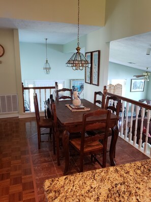 Engaging dining area, up a few steps from the main floor