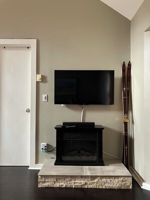 Smart tv with electric fireplace
