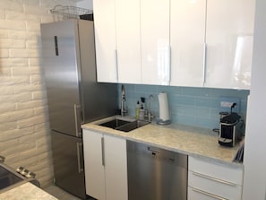 Elegant European kitchen
Cambria counters Top-shelf appliances