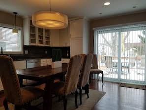 Spacious Kitchen with Center Table & Deck Access