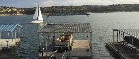 Outstanding view of Lake Travis and private boat dock (24X36) with upper deck.