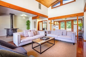 Living room area with Cathedral Windows offer spectacular views of Denison Peak