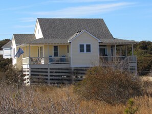 Seating and tables on both front and back decks.