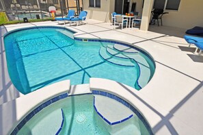 Private pool with covered lanai and child safety fence (took off for picture)