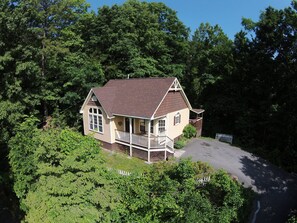 Aerial View. Situated on top of a knoll overlooking the Smoky Mountains. 