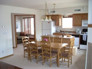 Dining area and kitchen and den