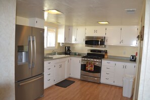 Kitchen stocked with cooking utensils