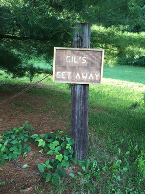 Sign at cabin driveway entrance