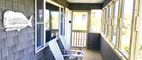 Sip your coffee or wine on the screened-in porch