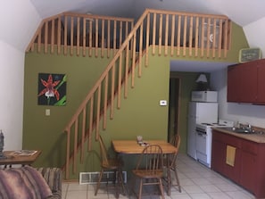 As you walk in, view of loft and main living room 