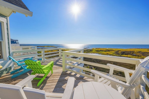 The stunning soundfront surroundings of this home will have you saying, "Sounds Terrific!"
