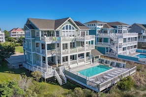 This spacious, luxurious 8-bedroom home provides unobstructed soundfront views and unmatched amenities.