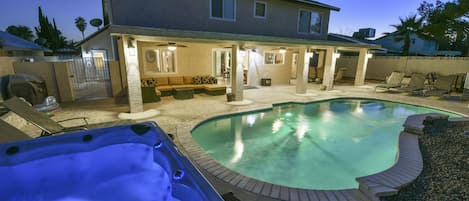 Private yard - pool, spa, fire pit,  BBQ, loungers, sectional and dining table 