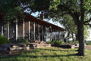 Beautifully shaded screened in porch