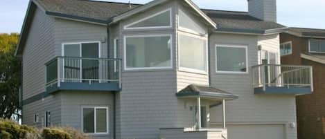 Front of house, all front windows have ocean views