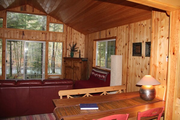 Views of the river through the dining and living rooms from the kitchen