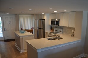  Newly Remolded Kitchen w/ Open Floor Plan with New Flooring.