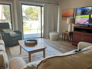 Another view of Family room with large HD Smart TV